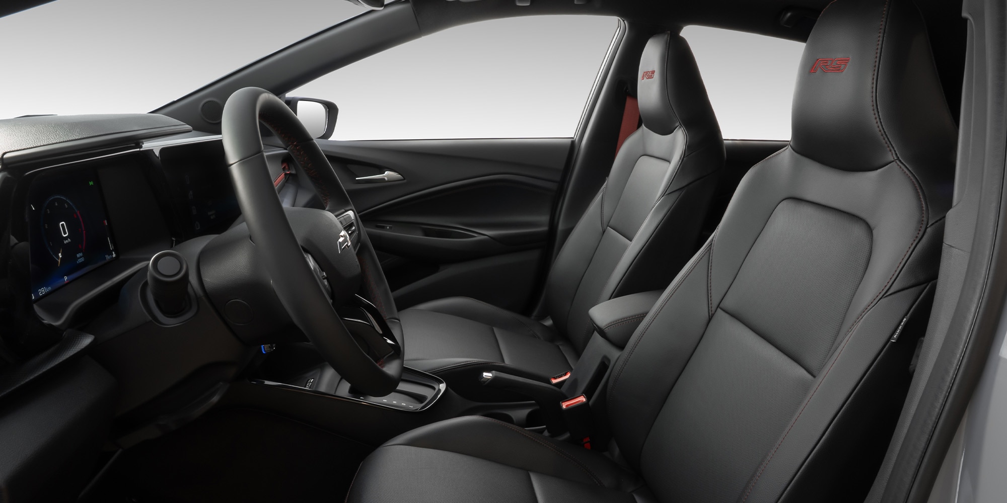 interior Chevrolet Sonic 2027 asientos y volante